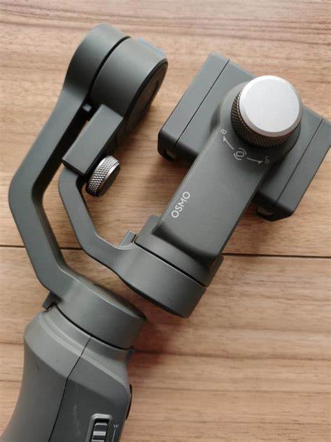 DJI Osmo Mobile 2 Smartphone Gimbal – 3-Axis Stabilizer with Base (Used, 90%)